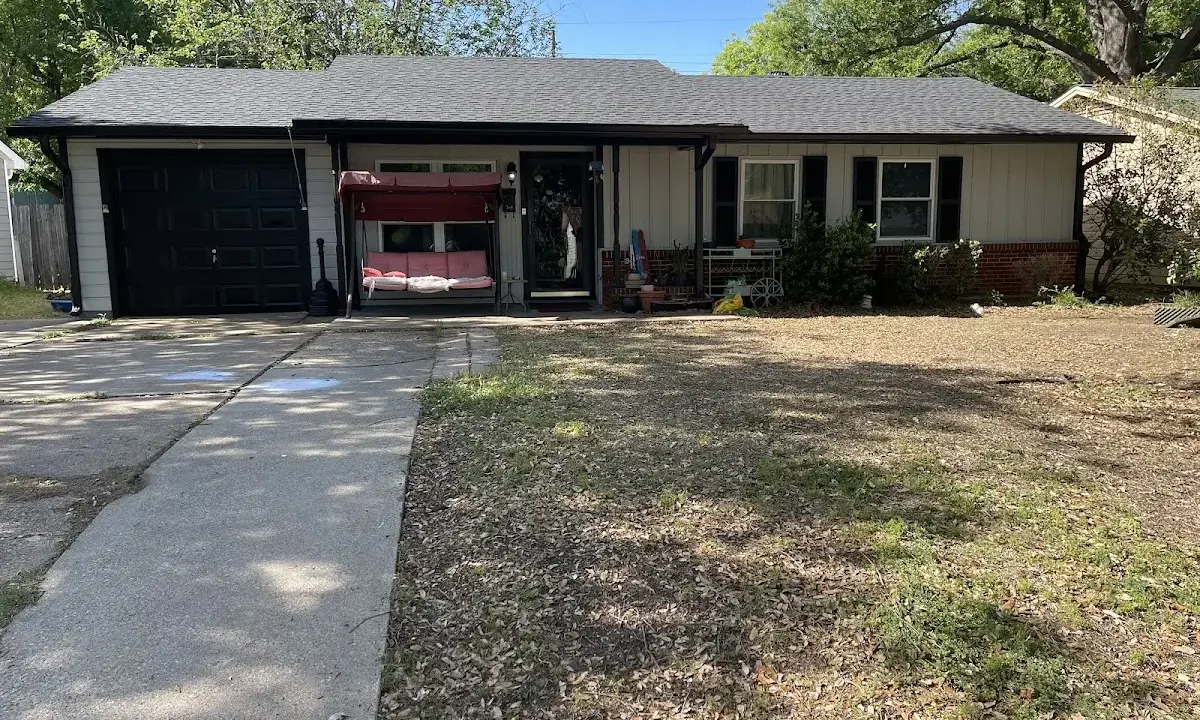 Hail Damage Roof Repair crew at work on a residential roof in Montgomery